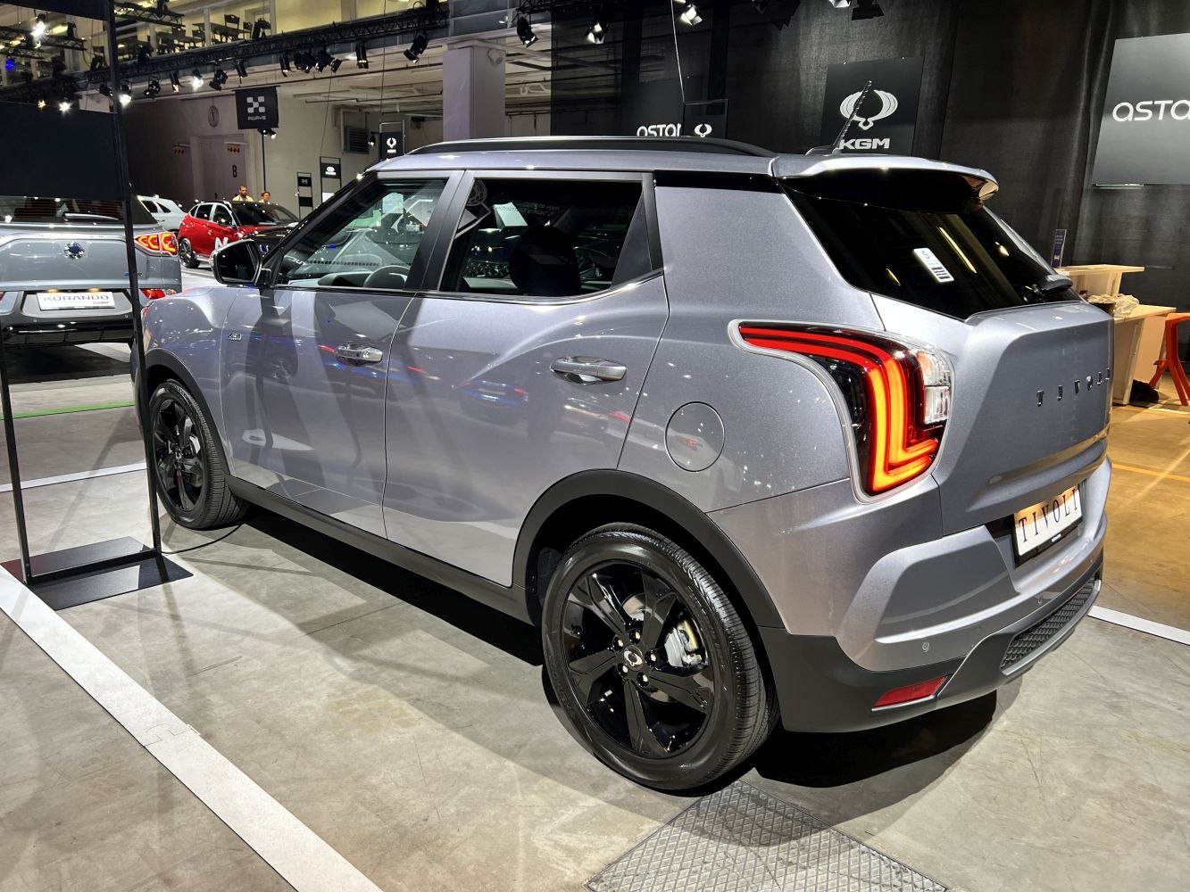 Rear LED tail lights and glossy black alloy wheels on a compact SUV