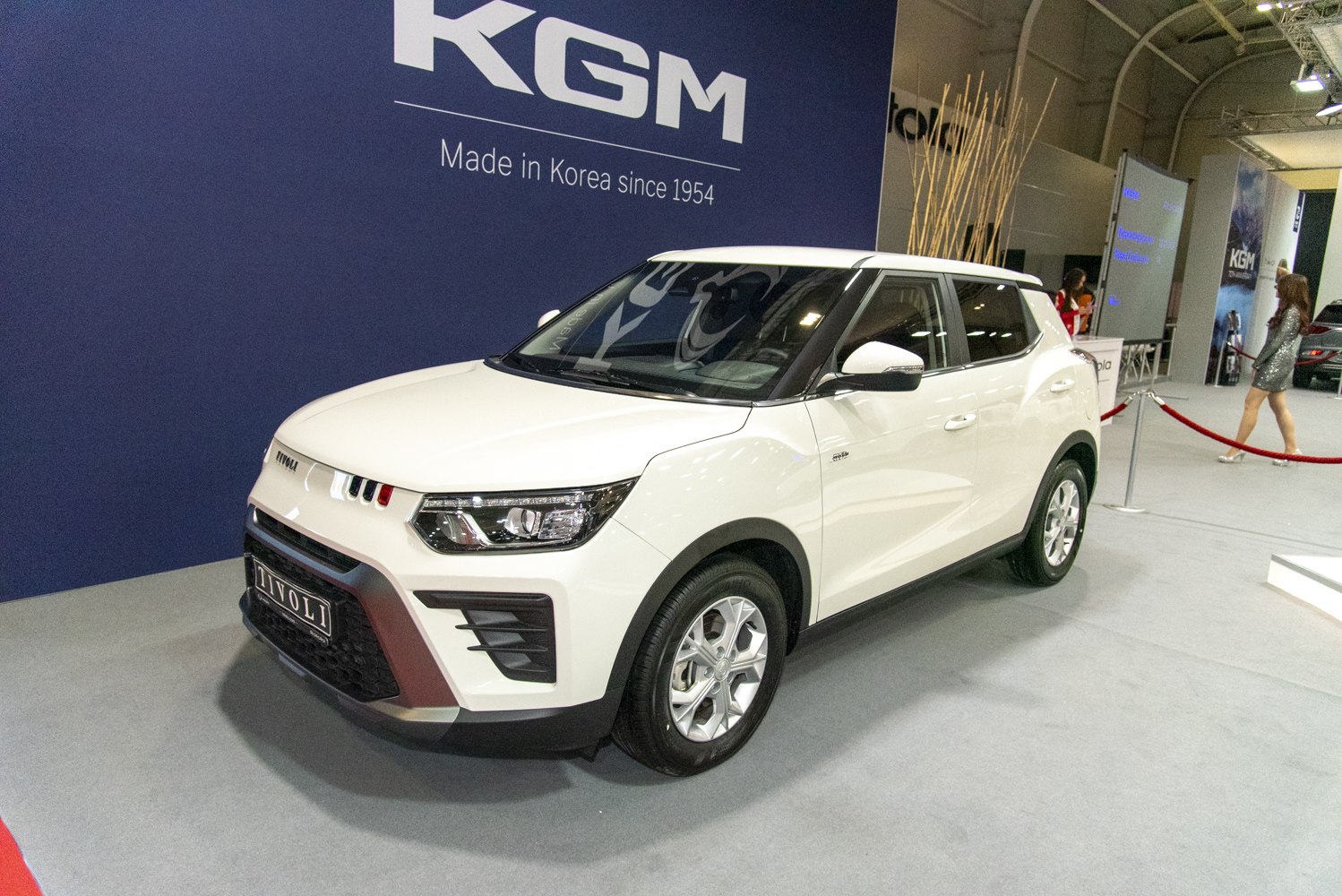 Compact SUV front three-quarter view with distinctive headlights and grille