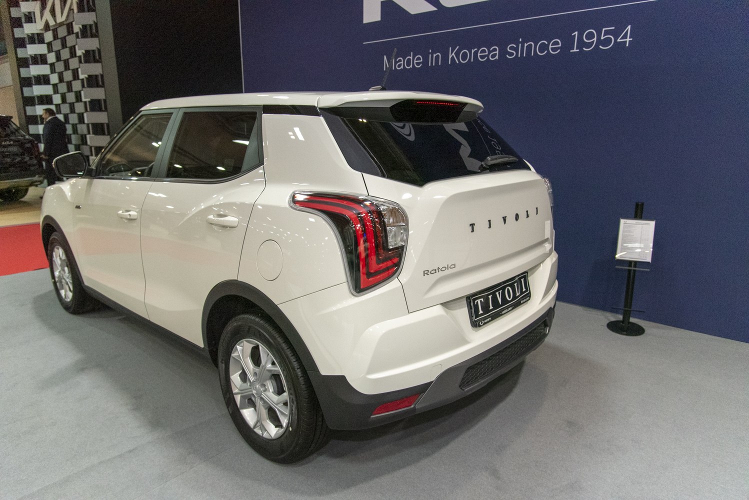 Rear side view with L-shaped tail lights and modern compact SUV design