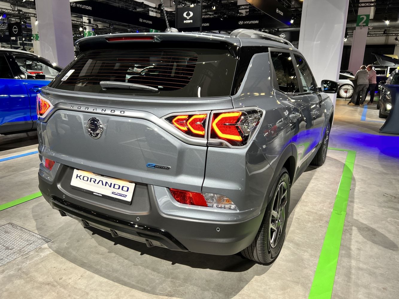 Rear view of a modern SUV with LED tail lights and e-Motion badge