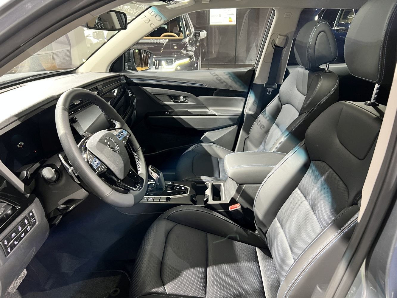 Modern SUV interior with leather seats and advanced dashboard design