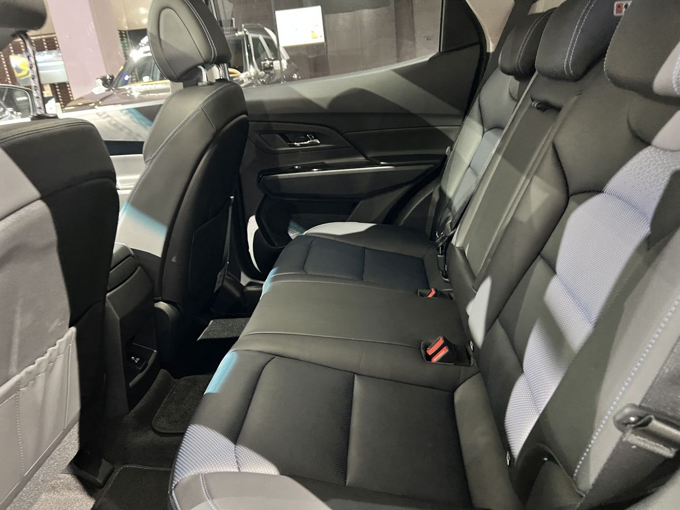 Spacious rear seat interior with ergonomic seating and quality upholstery.