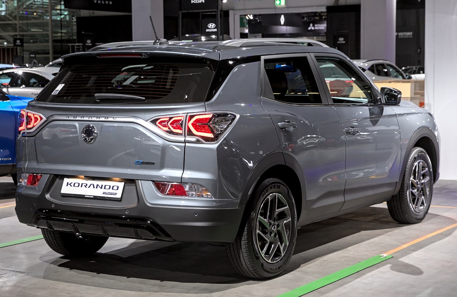 Rear view of modern SUV with distinctive tail lights and roof rails
