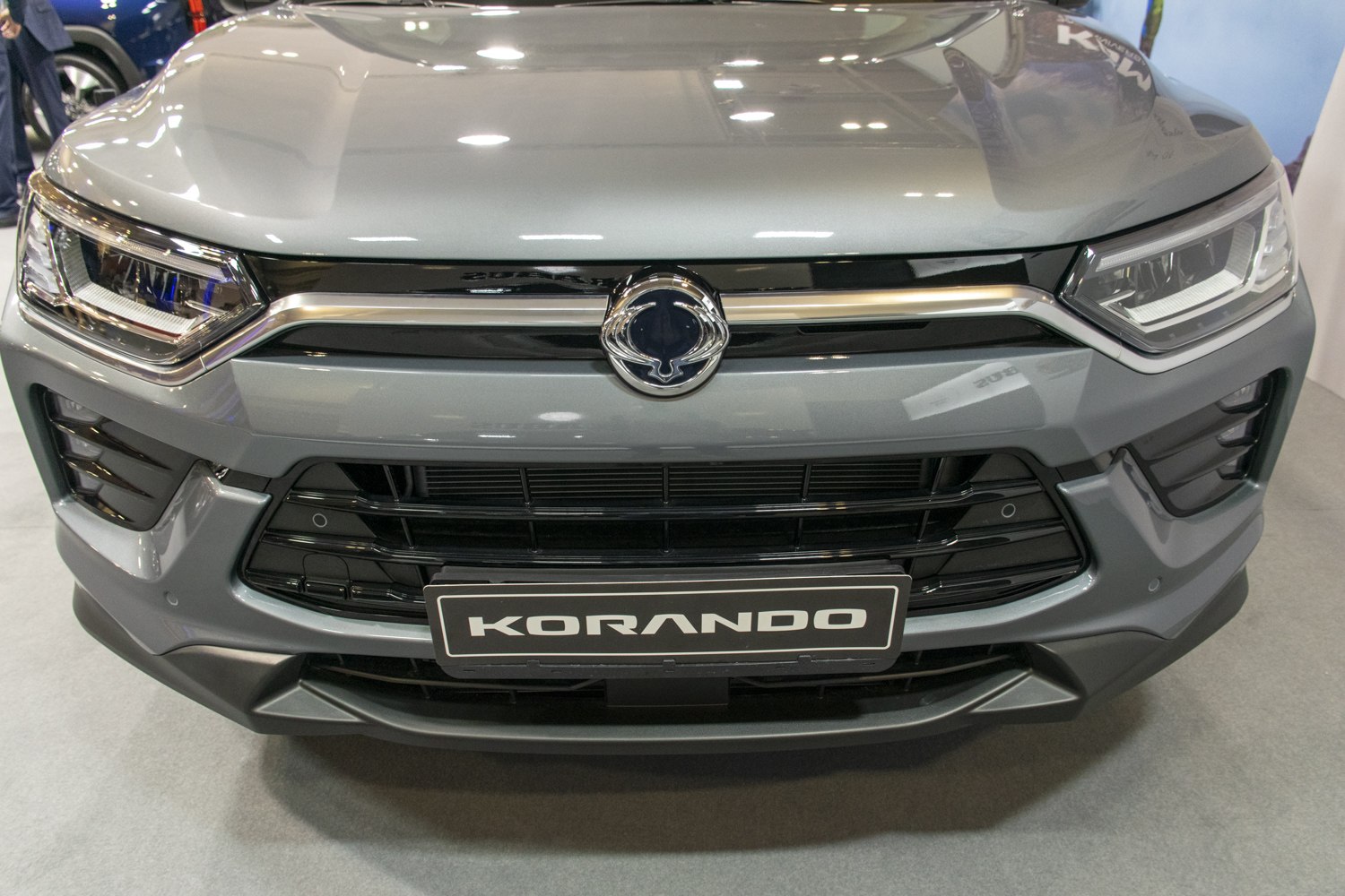 Front grille and headlights of a modern vehicle.