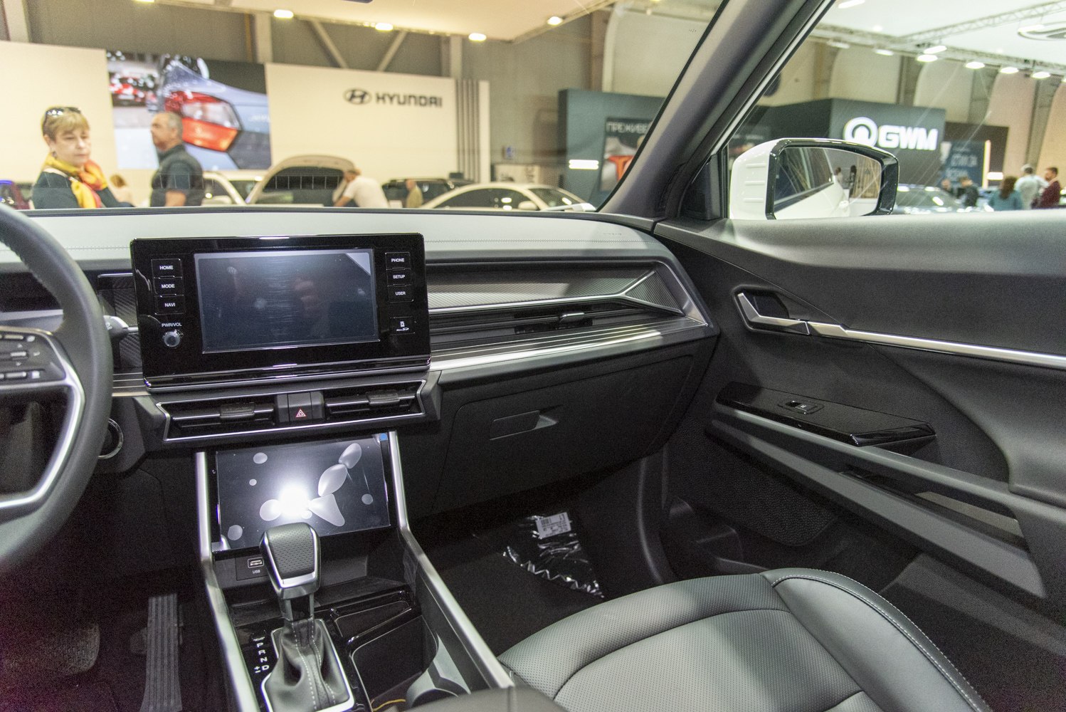 Modern dashboard with dual touchscreen displays and automatic gear shift