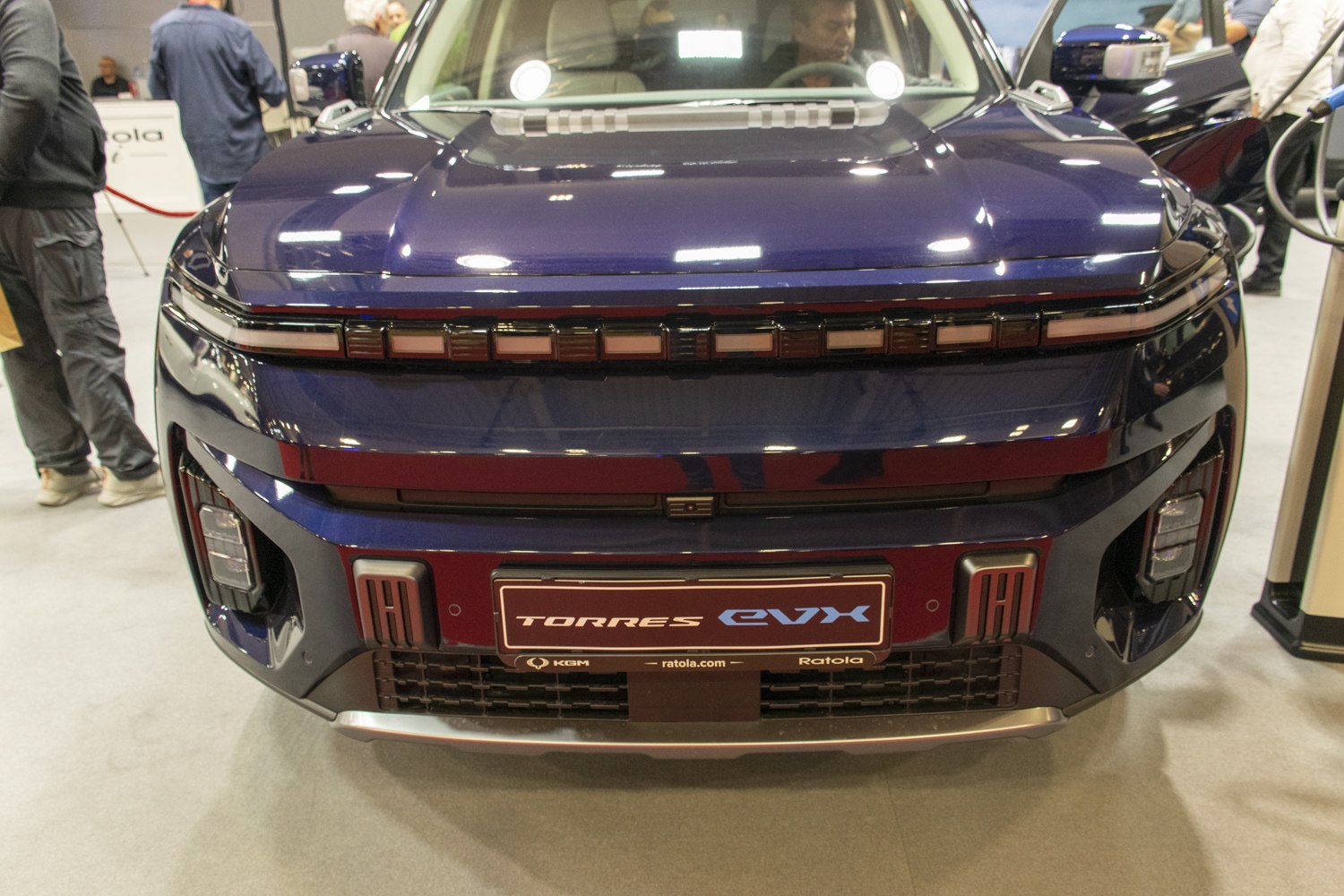 Front view with LED light bar and aggressive grille design