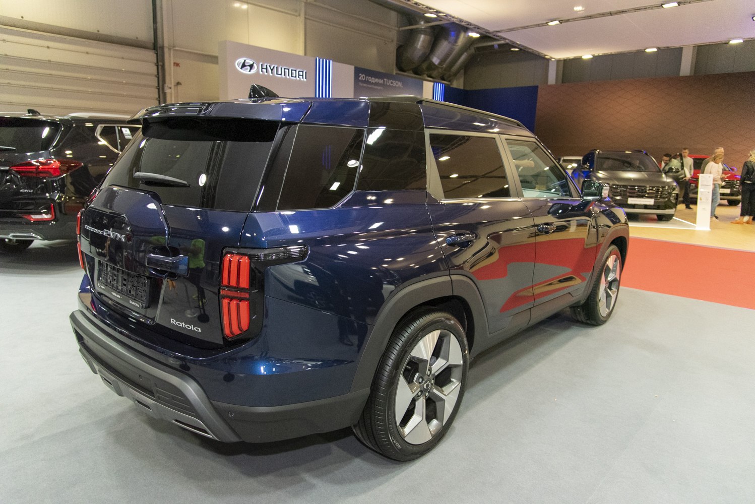 Rear side view with vertical taillights and blacked-out windows