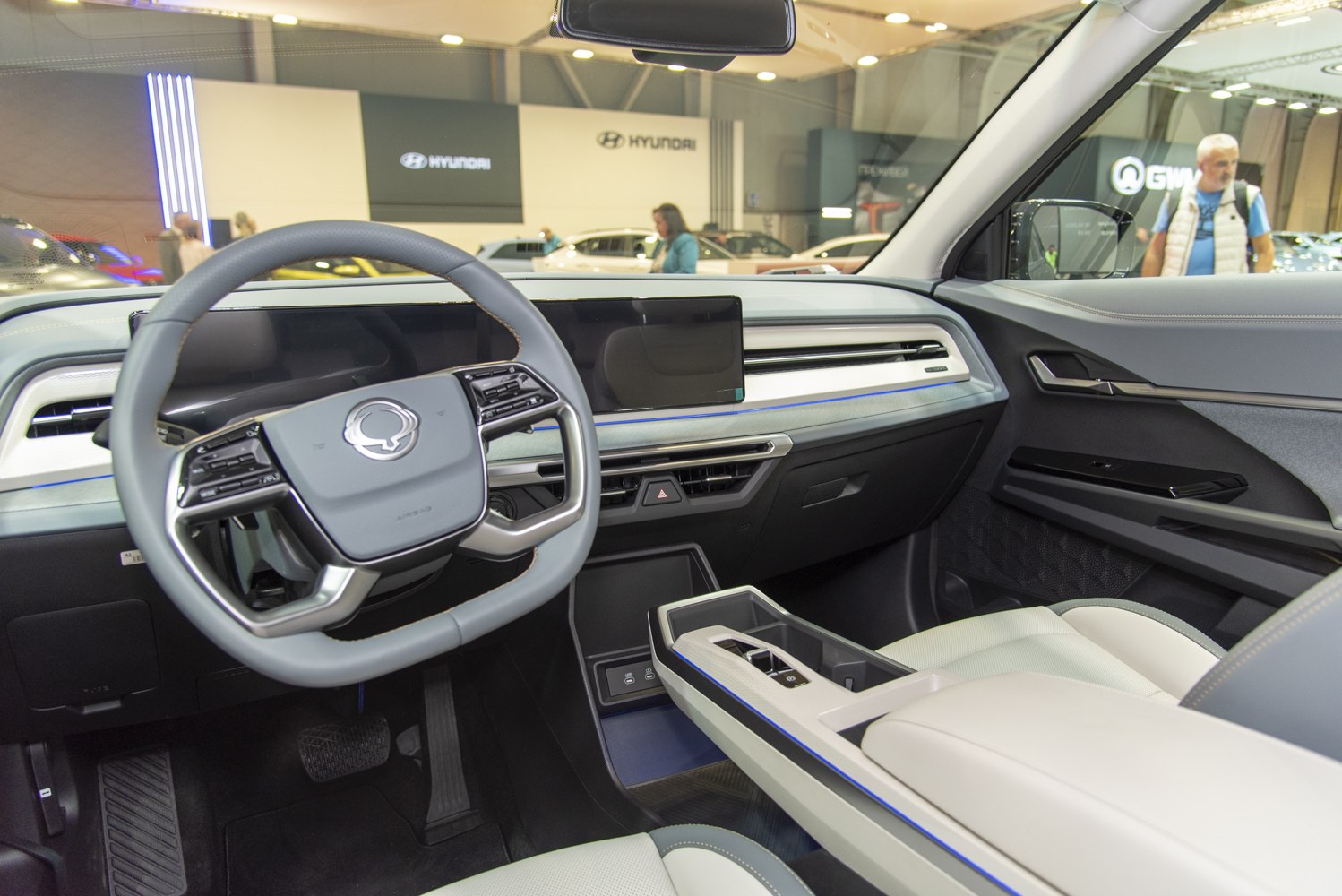 Minimalist steering wheel and modern digital dashboard with control interface