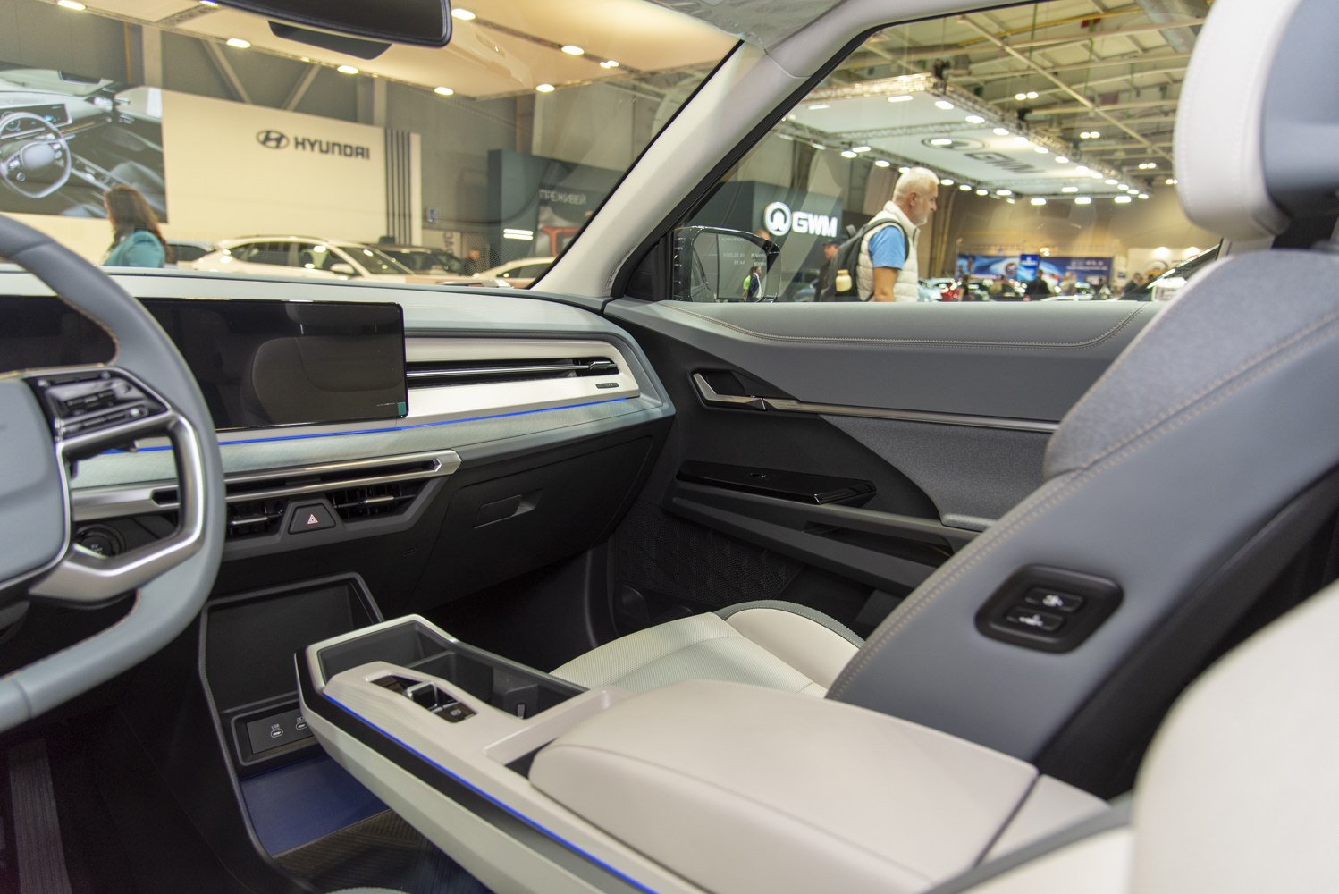 Modern dashboard layout and premium seating in car interior