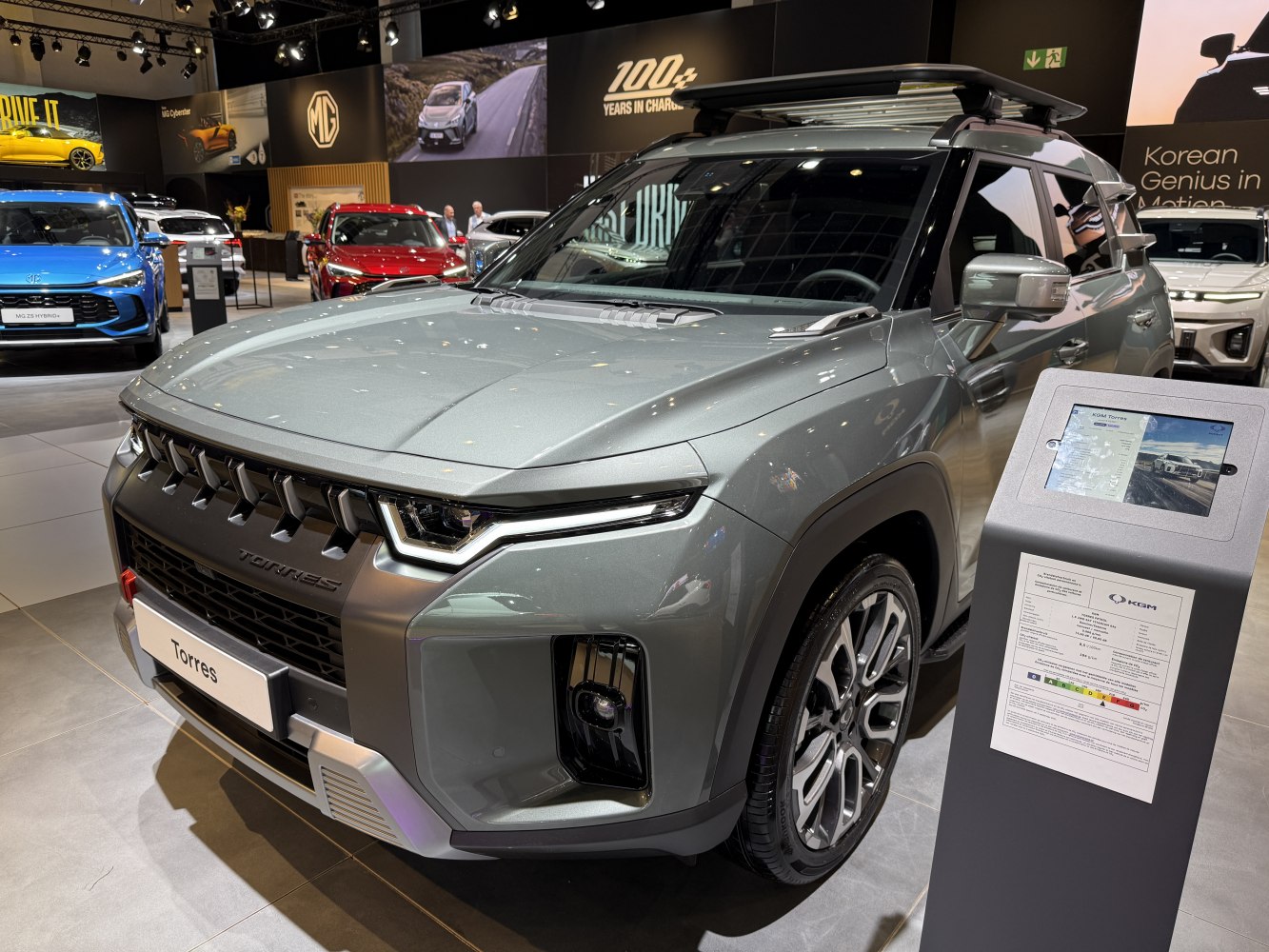 Front view of a modern SUV with distinctive grille and roof rack