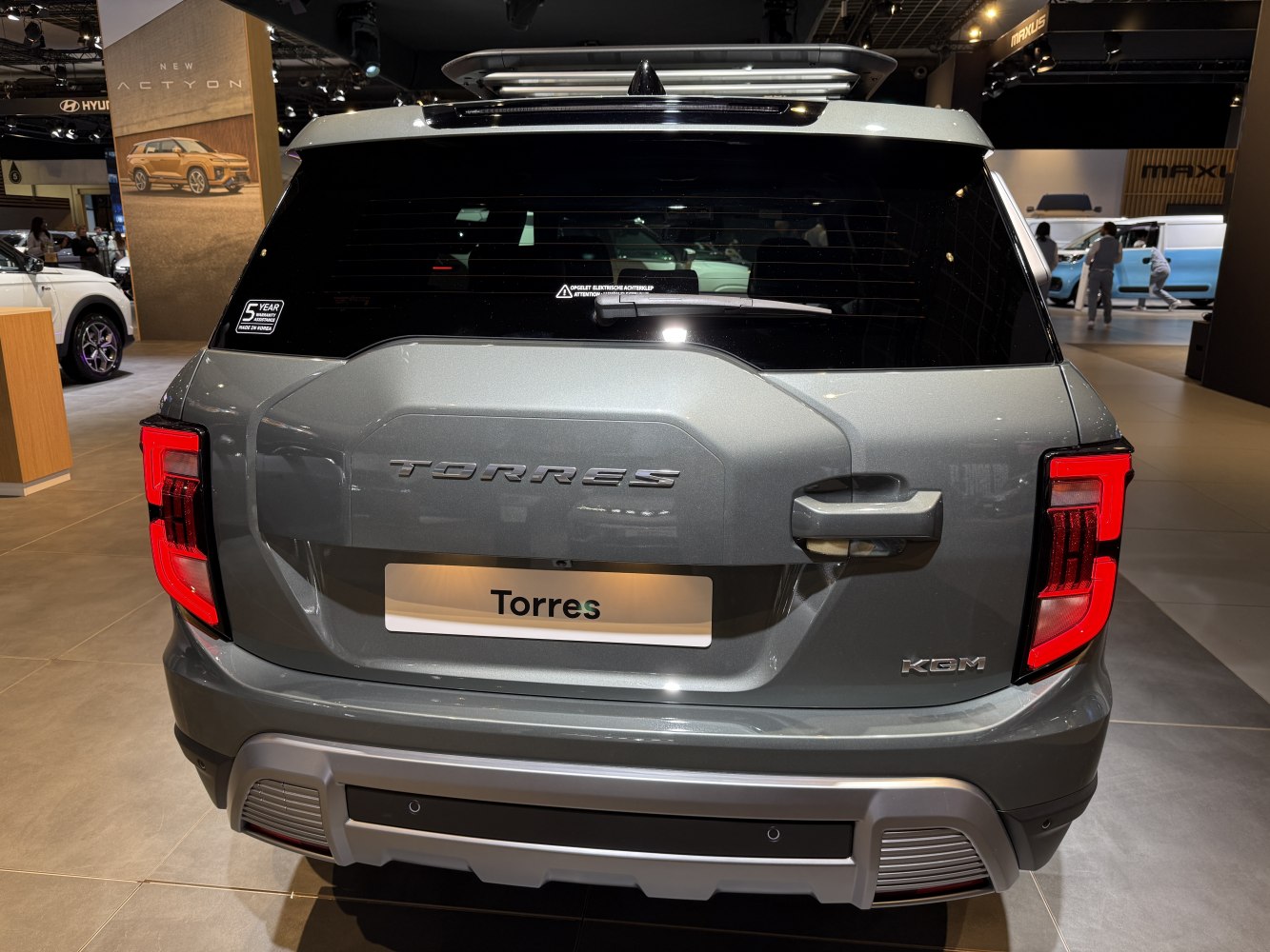 Rear view of SUV with unique taillights and tailgate design