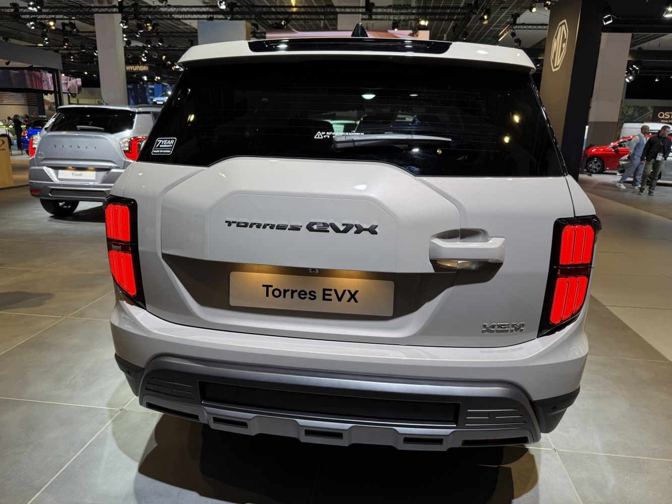 Rear view with distinctive red taillights and rugged rear bumper design