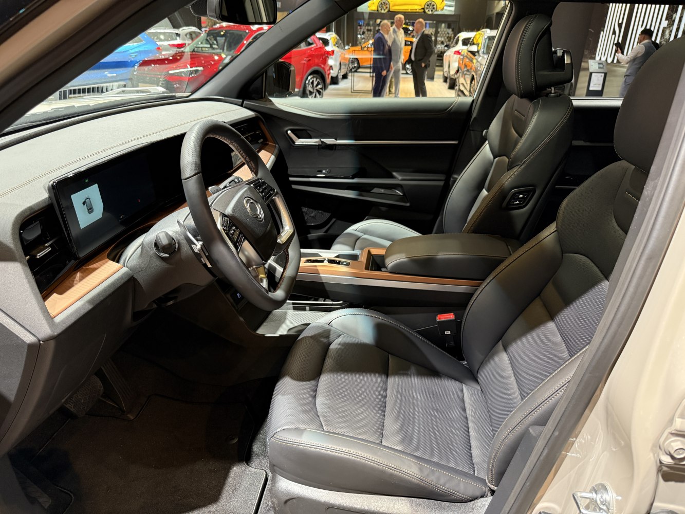 Modern car interior with digital dashboard and leather seats