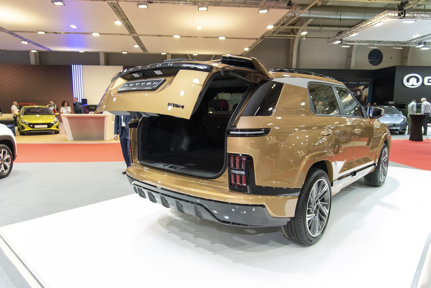 Rear view of SUV with open tailgate and modern taillights