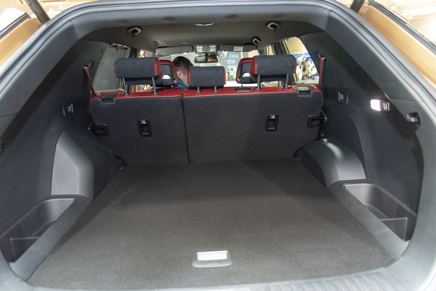Spacious rear cargo area with foldable rear seats and enhanced storage compartments