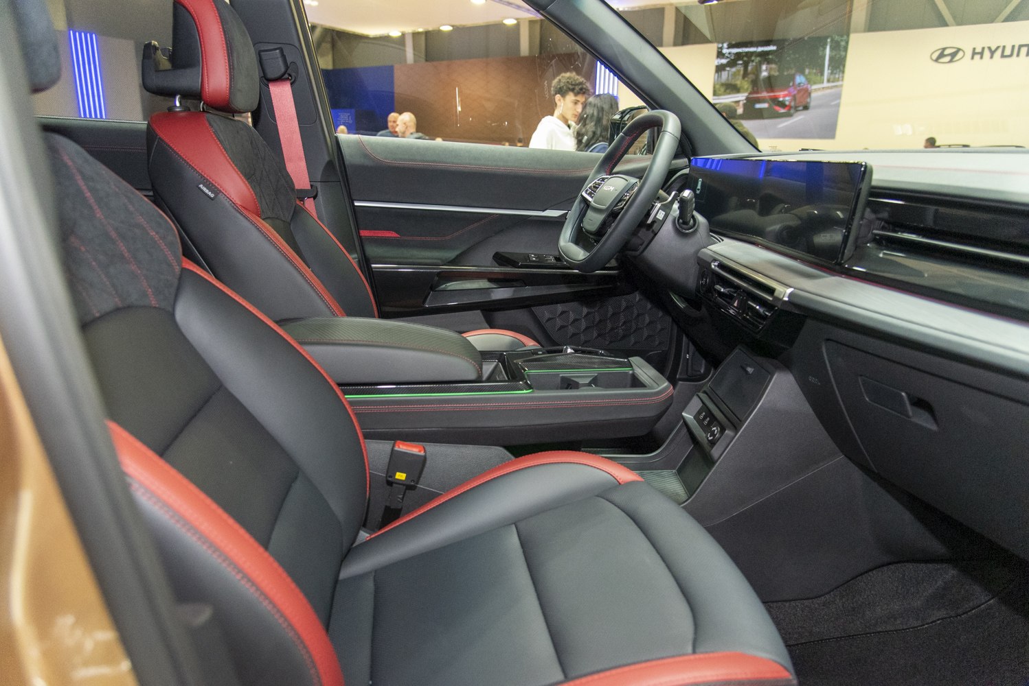 Premium red-black seats with digital dashboard display