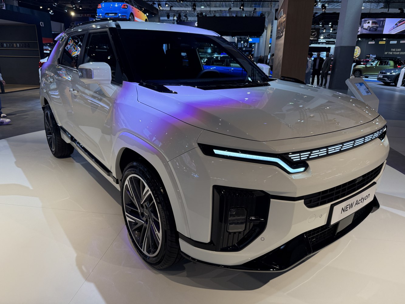 Front view of modern SUV with LED headlights and sharp lines