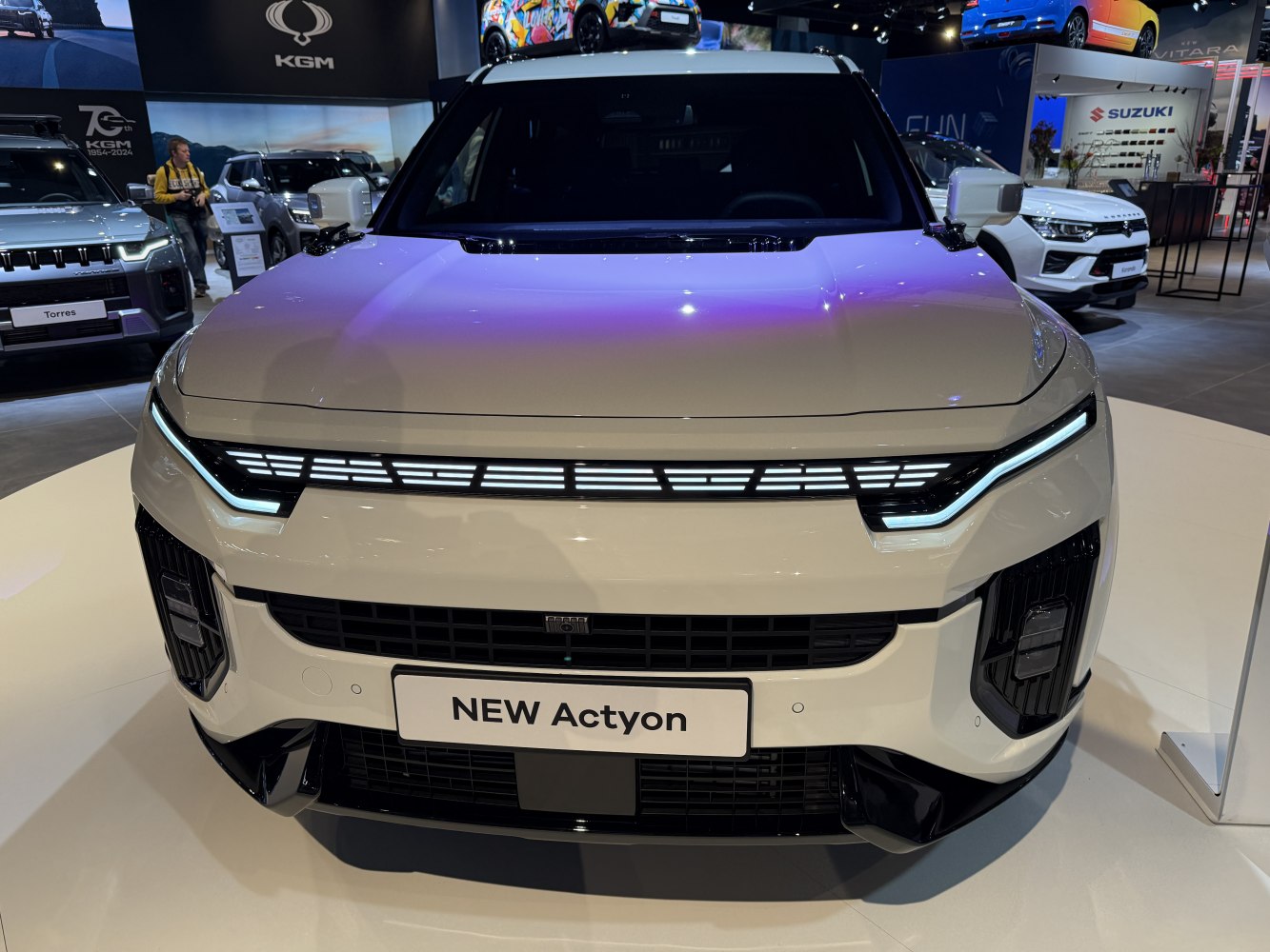 Front view with LED light bar and distinctive grille design