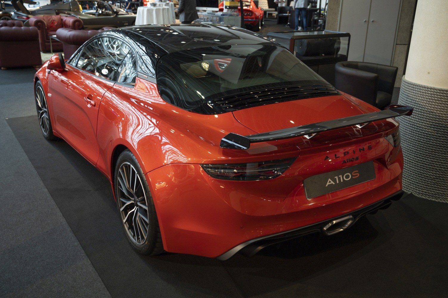 Rear view with sporty spoiler and sleek taillights