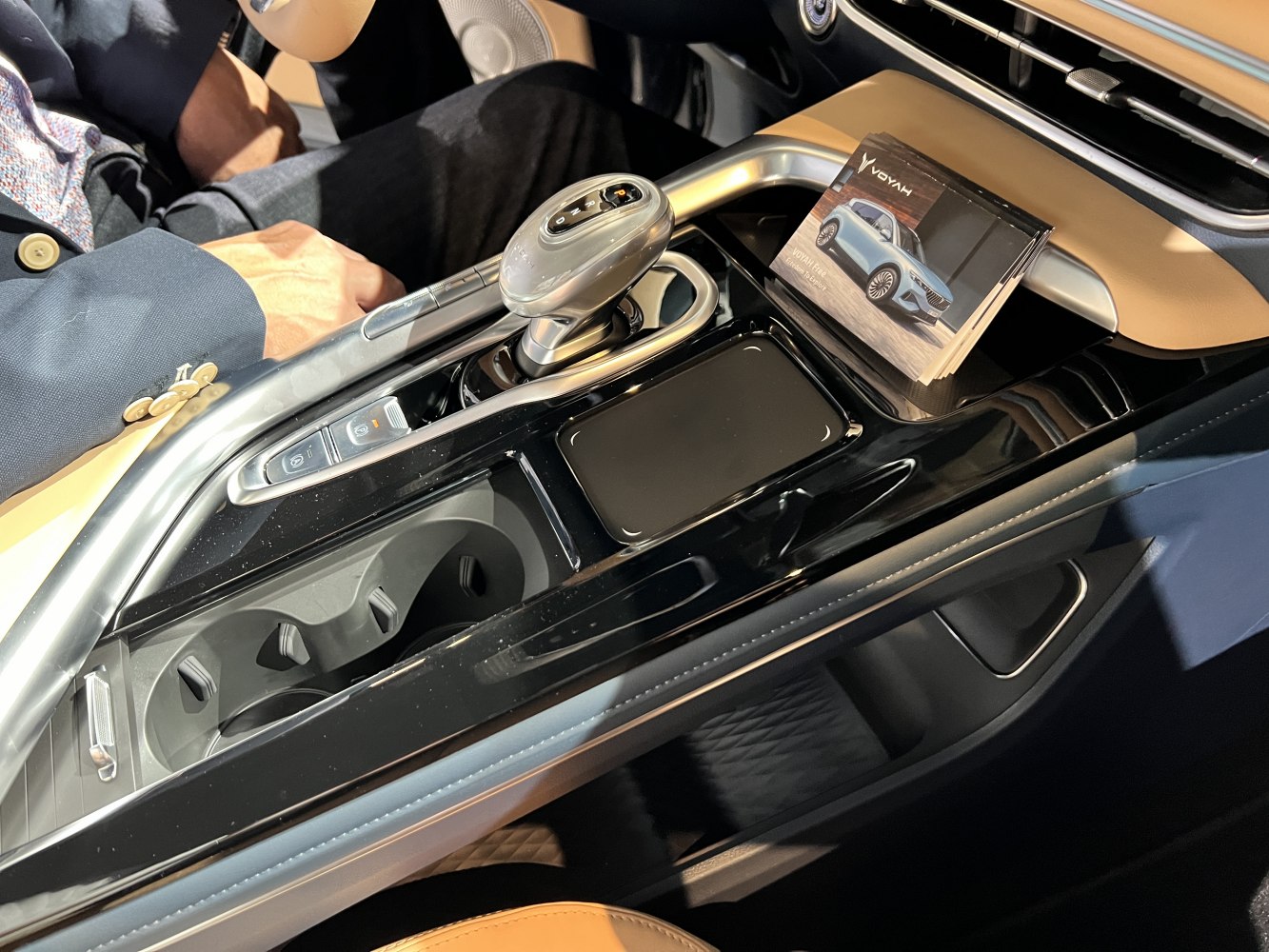Center console with gear shift and cup holders