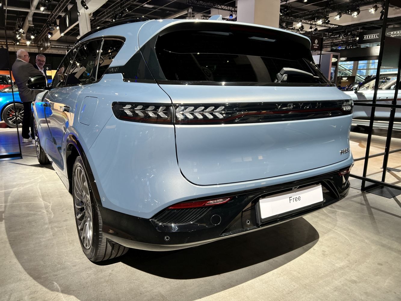 Rear view of SUV with distinctive tail lights and smooth body design