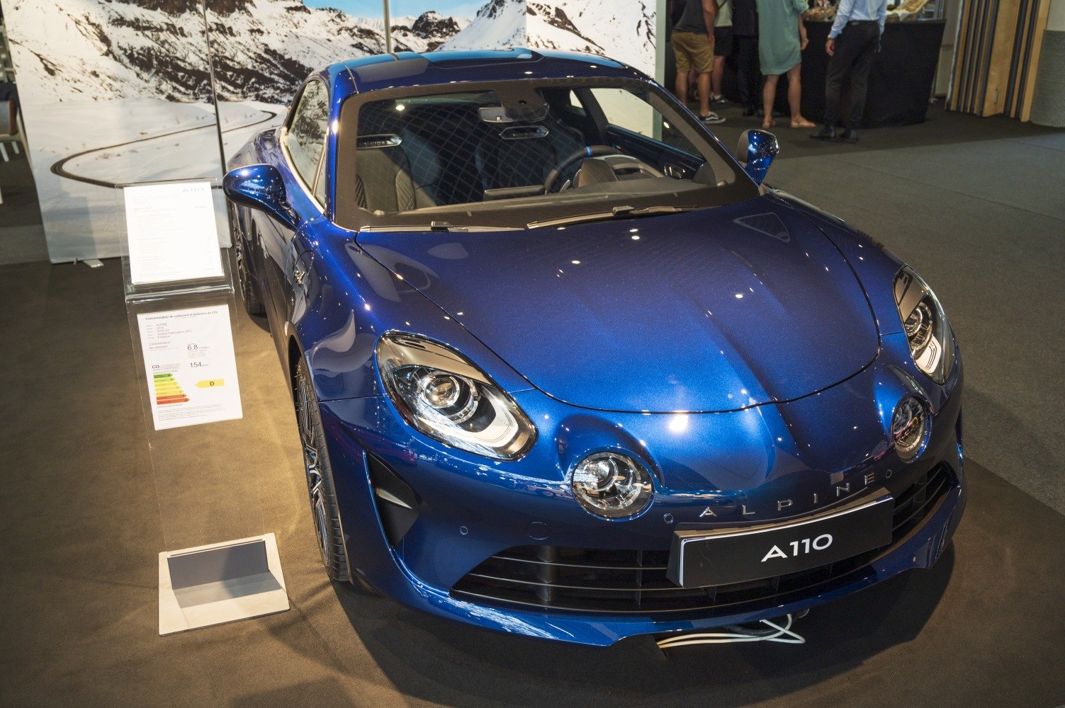 Front view of a sports coupe with rounded headlights and aerodynamic curves