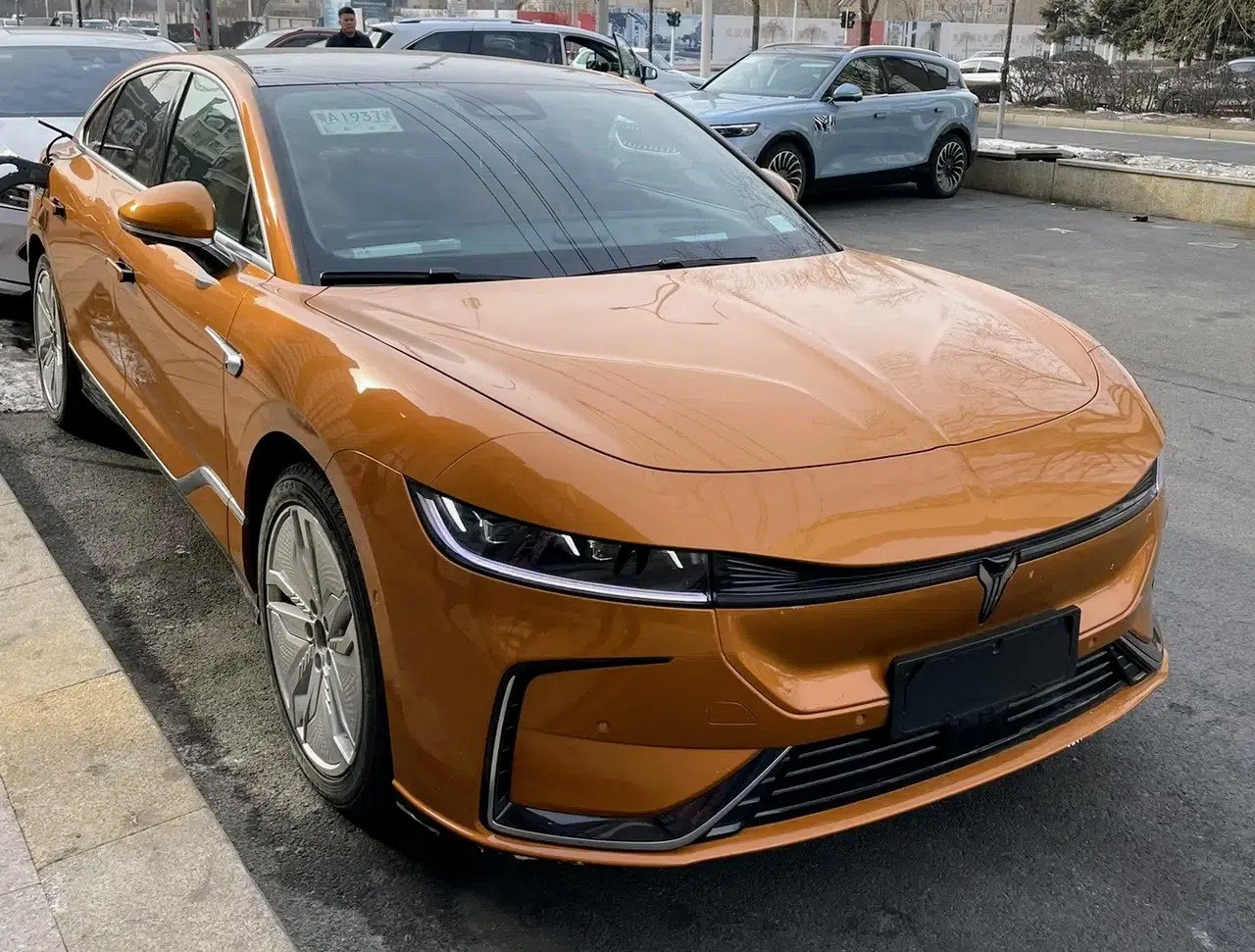 Sleek front fascia with sharp LED headlights and aerodynamic design