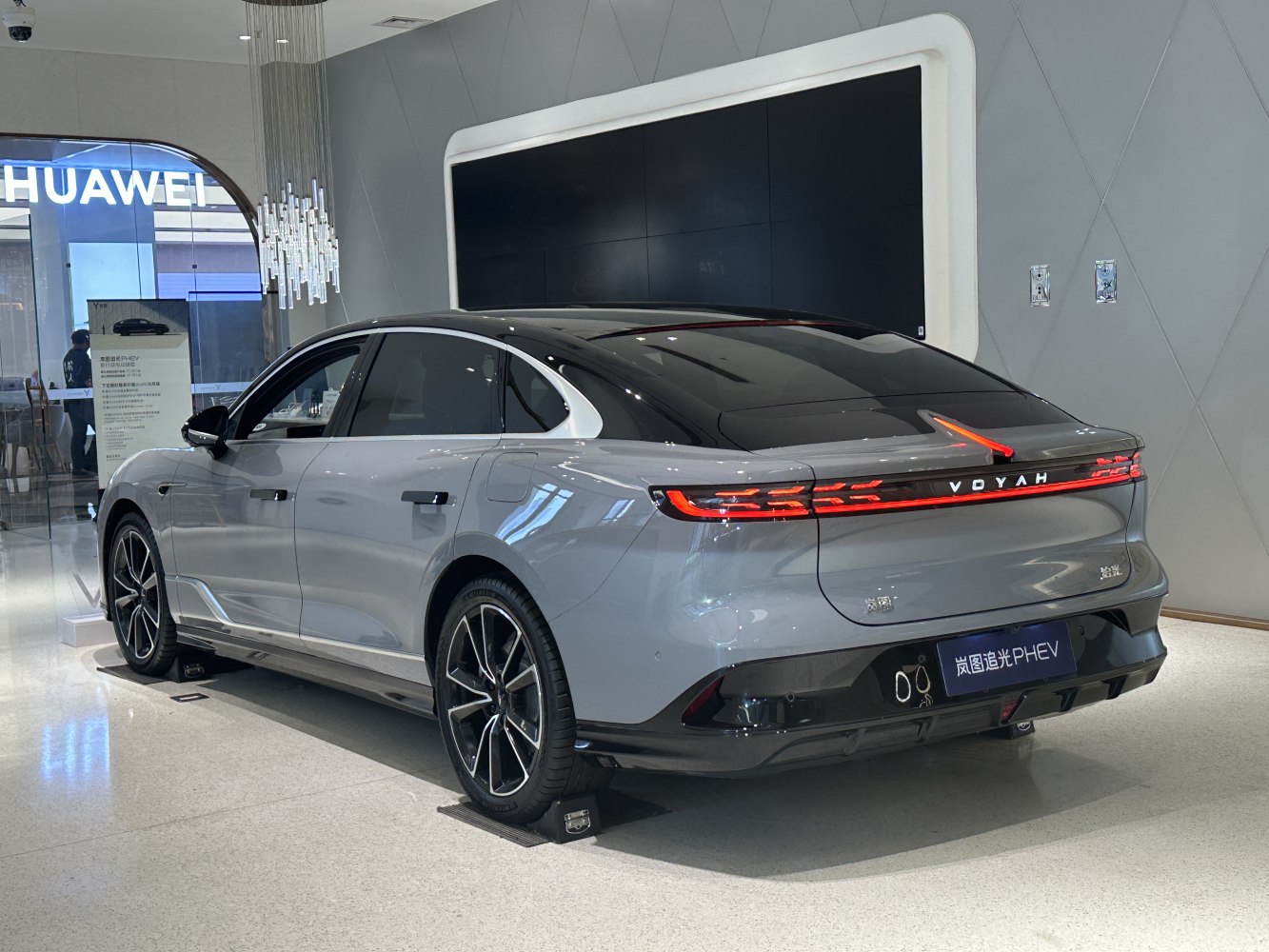 Rear and side view with LED light strip and panoramic black roof