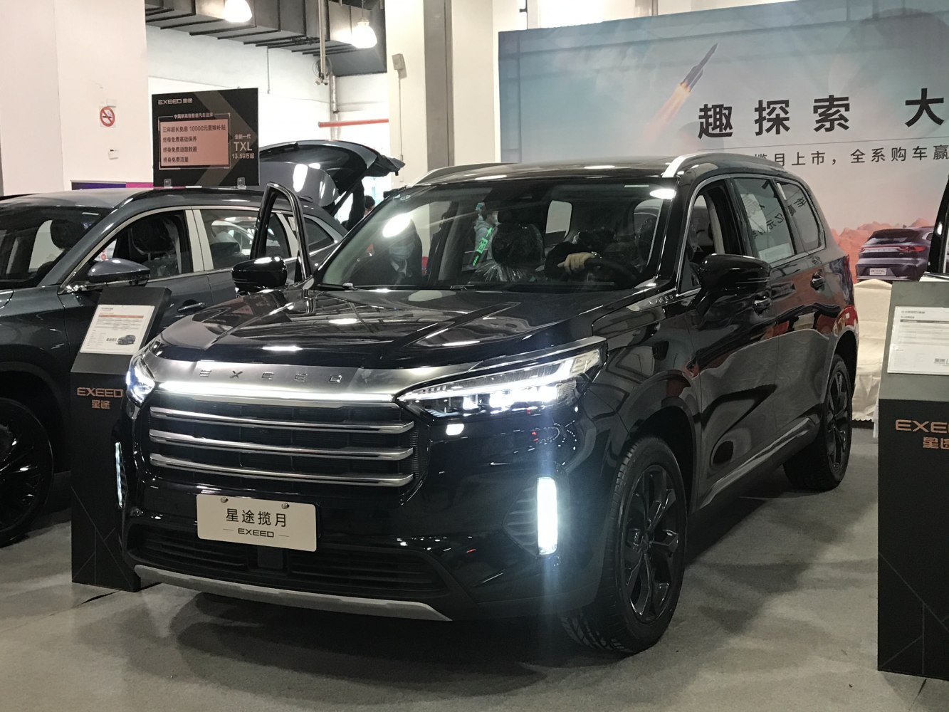 Front view of SUV with LED headlights and horizontal grille bars