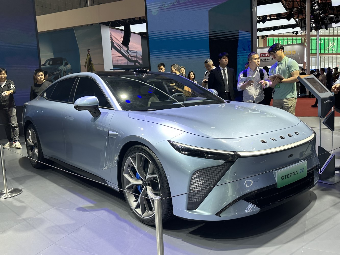 Sleek electric sedan with aerodynamic design and premium alloy wheels