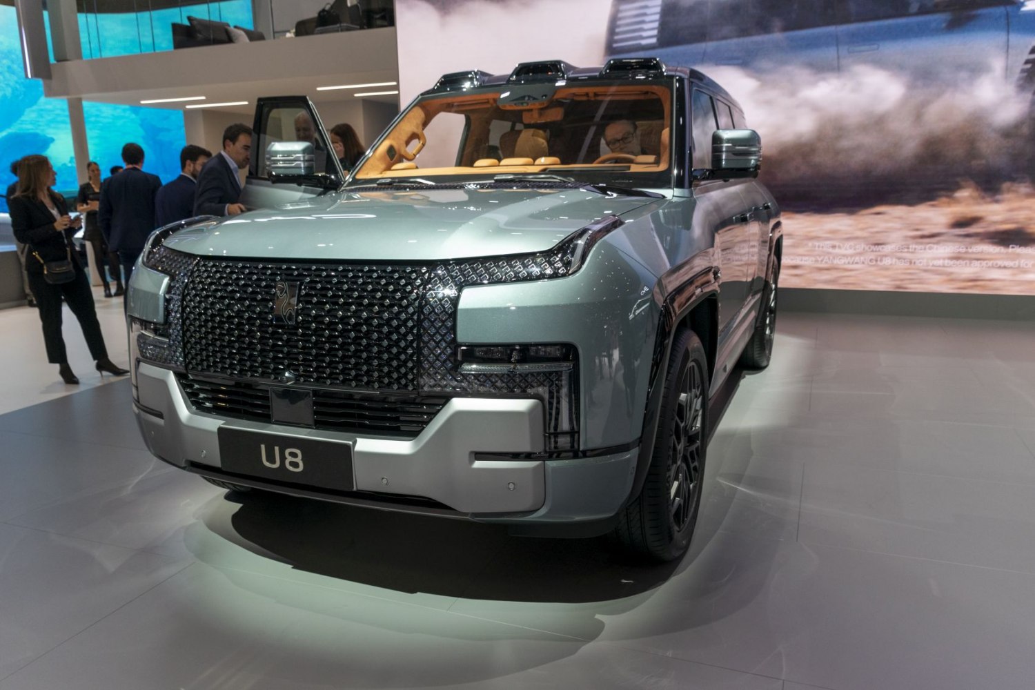 Front view luxury SUV with textured grille and LED headlights