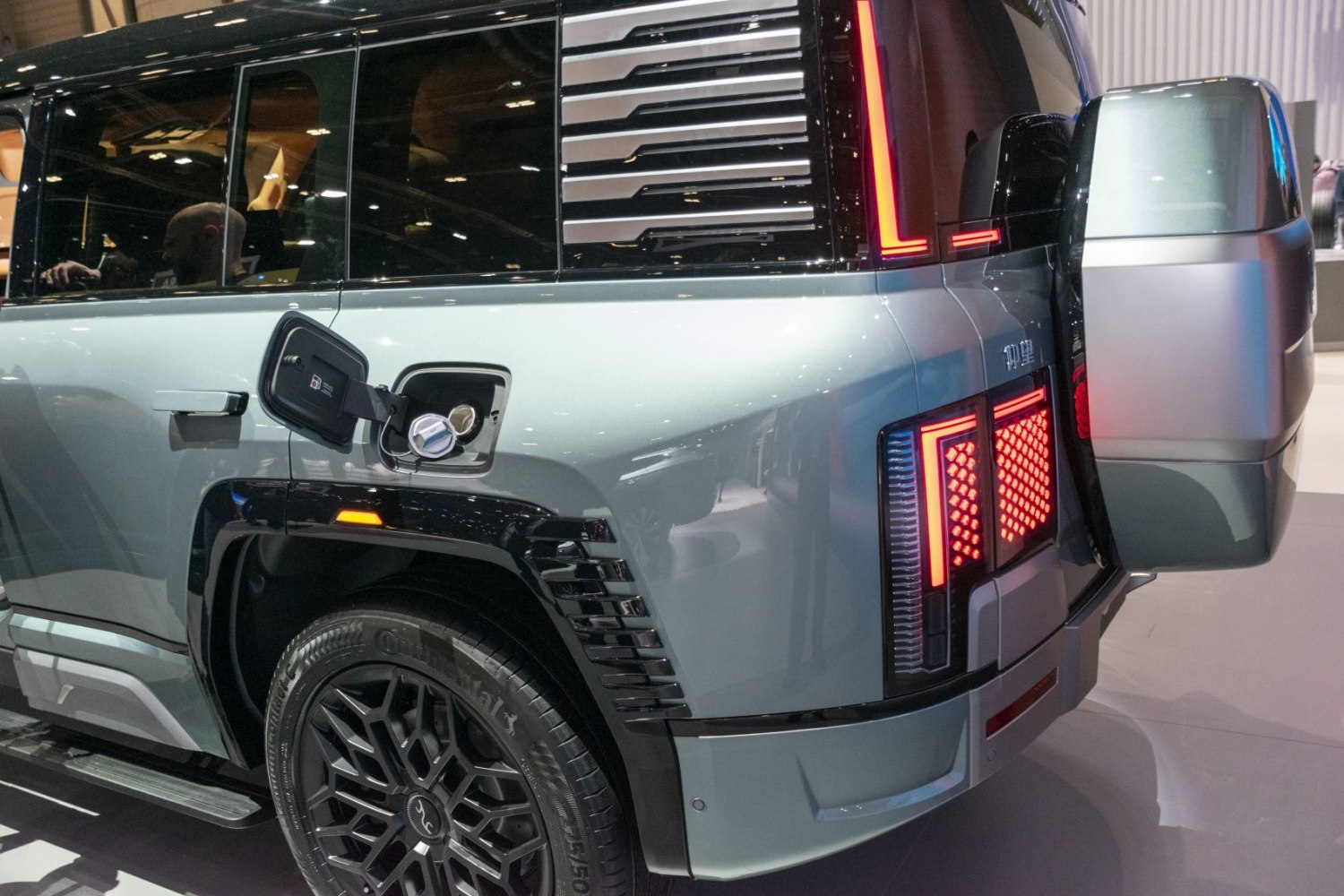 Rear charging port and vertical LED tail lights on SUV rear