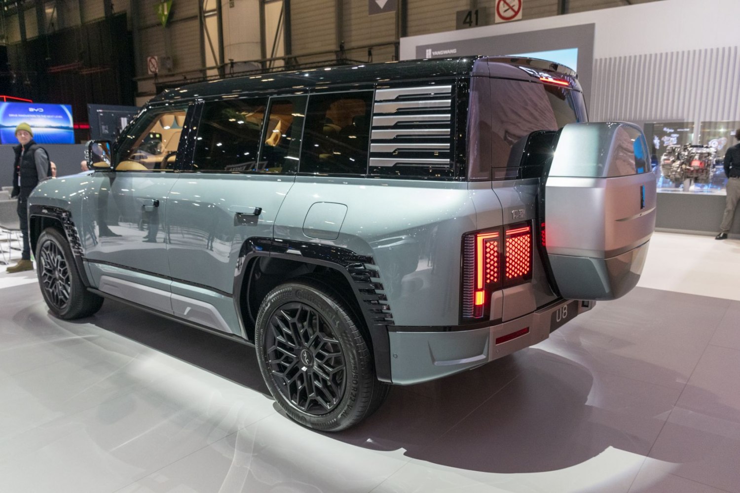 Rear and side view with distinctive tail lights and unique wheel design