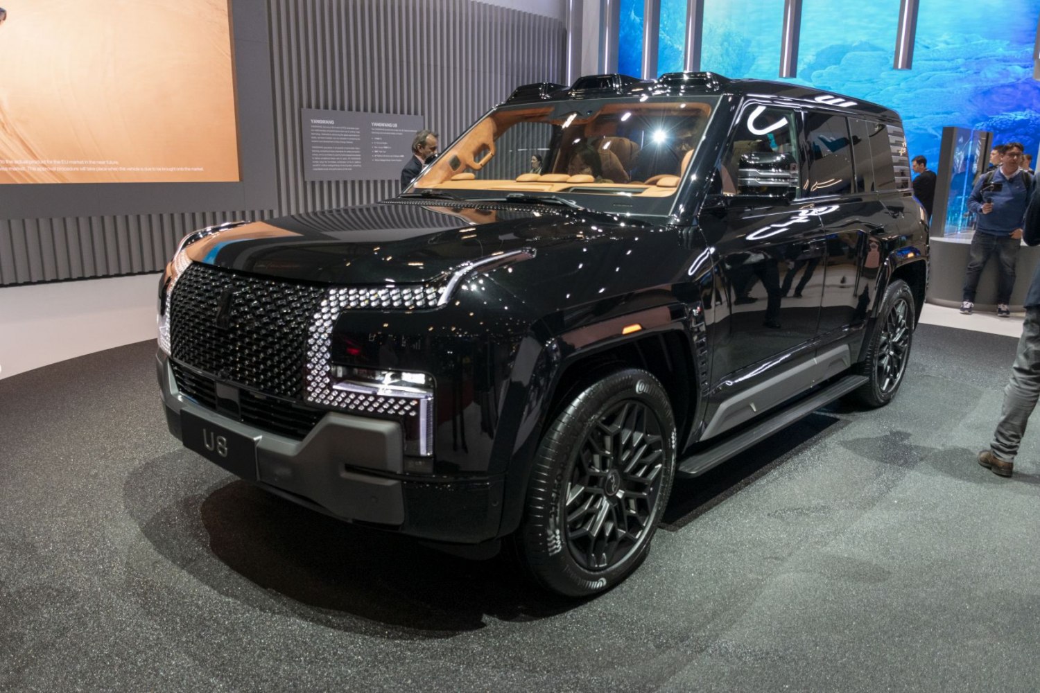 Black SUV with distinctive front grille and modern side profile
