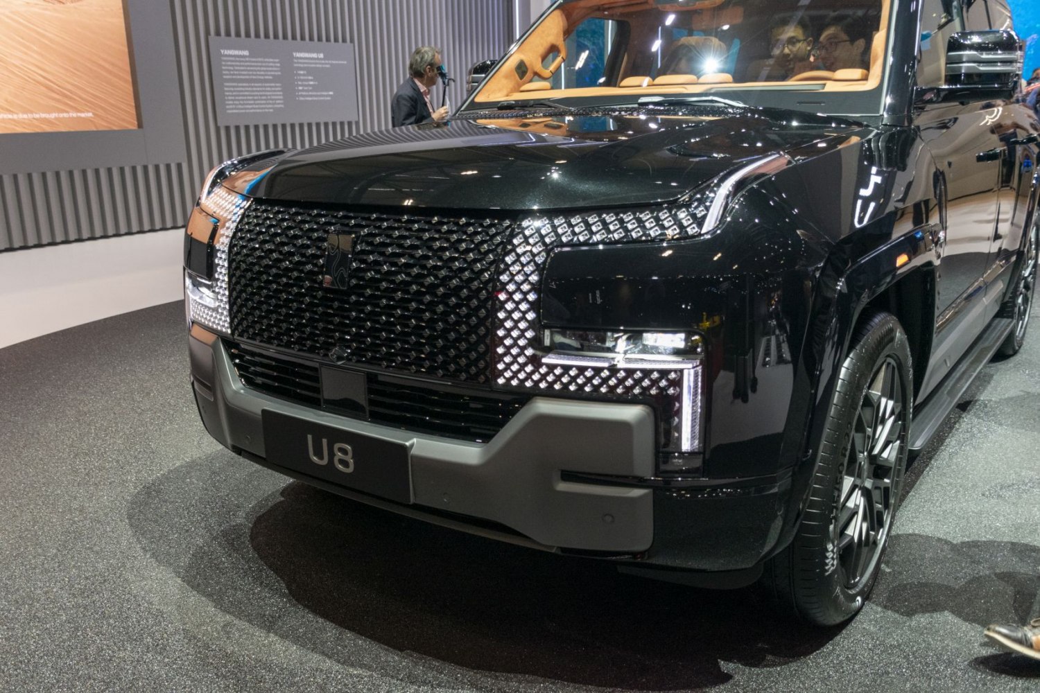 Modern SUV front grille with intricate LED headlights and bold styling