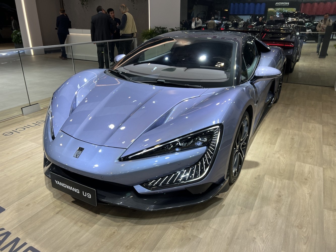 Sleek front with sharp LED headlights and aerodynamic design