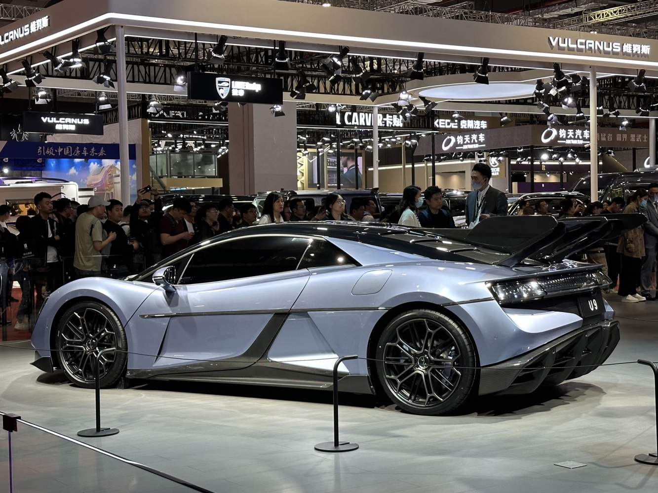 Sleek electric hypercar with active rear wing and aerodynamic body