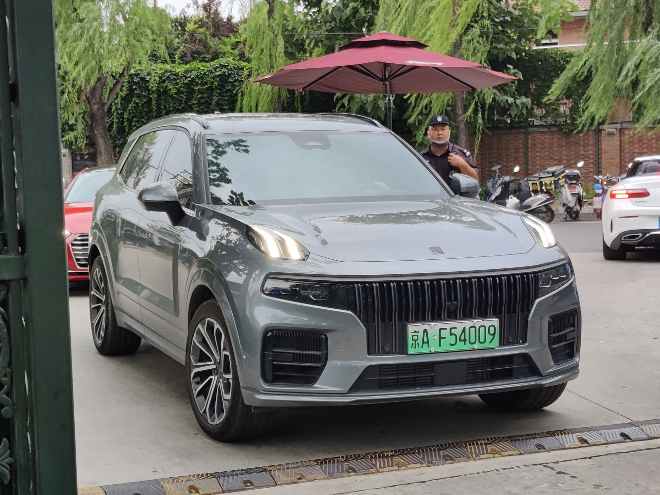 Front grille and vertical headlights of a modern luxury SUV