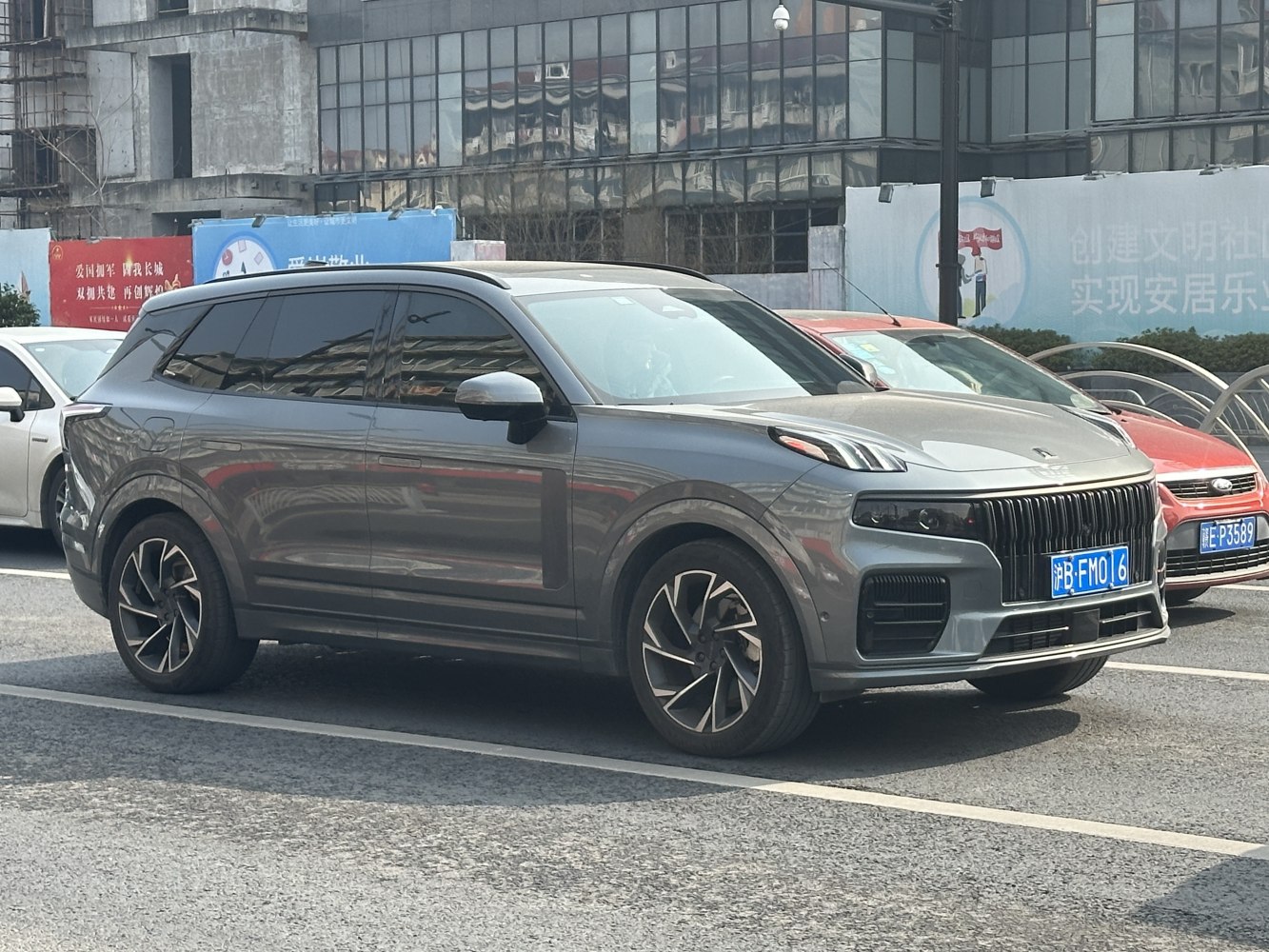SUV with distinct front grille and alloy wheels side view