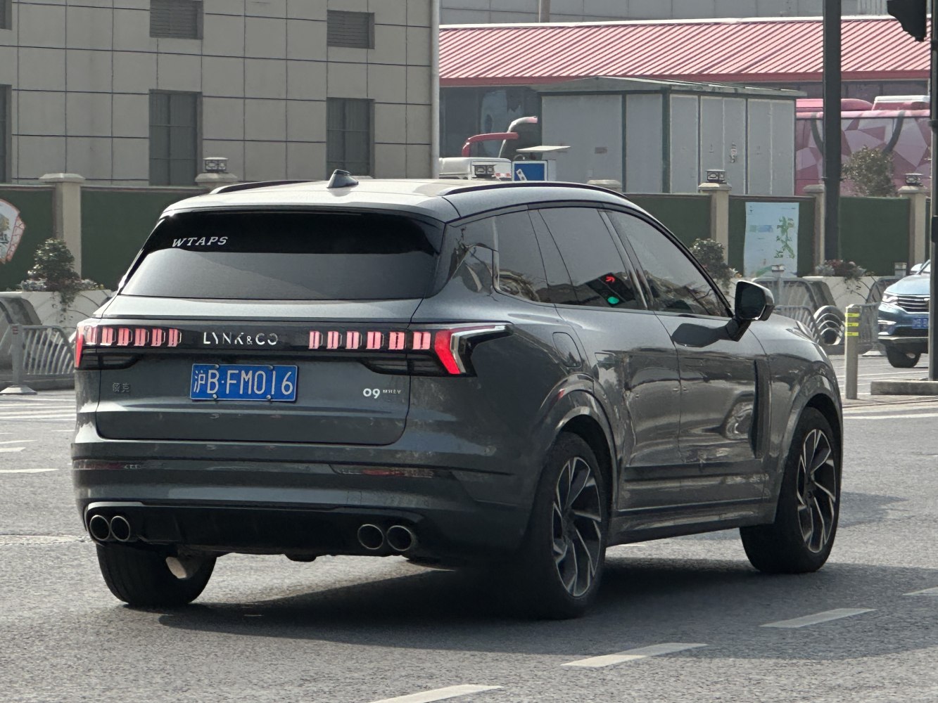 Rear view of SUV with quad exhausts and distinctive taillights