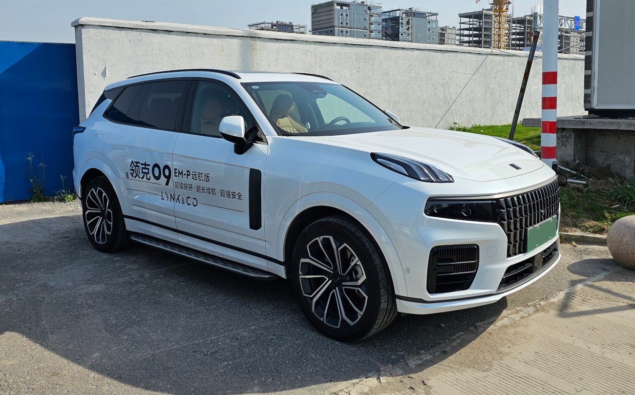 White SUV with bold grille and sleek LED headlights