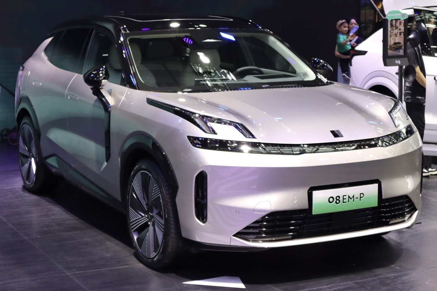 Front view with sleek LED headlights and aerodynamic design