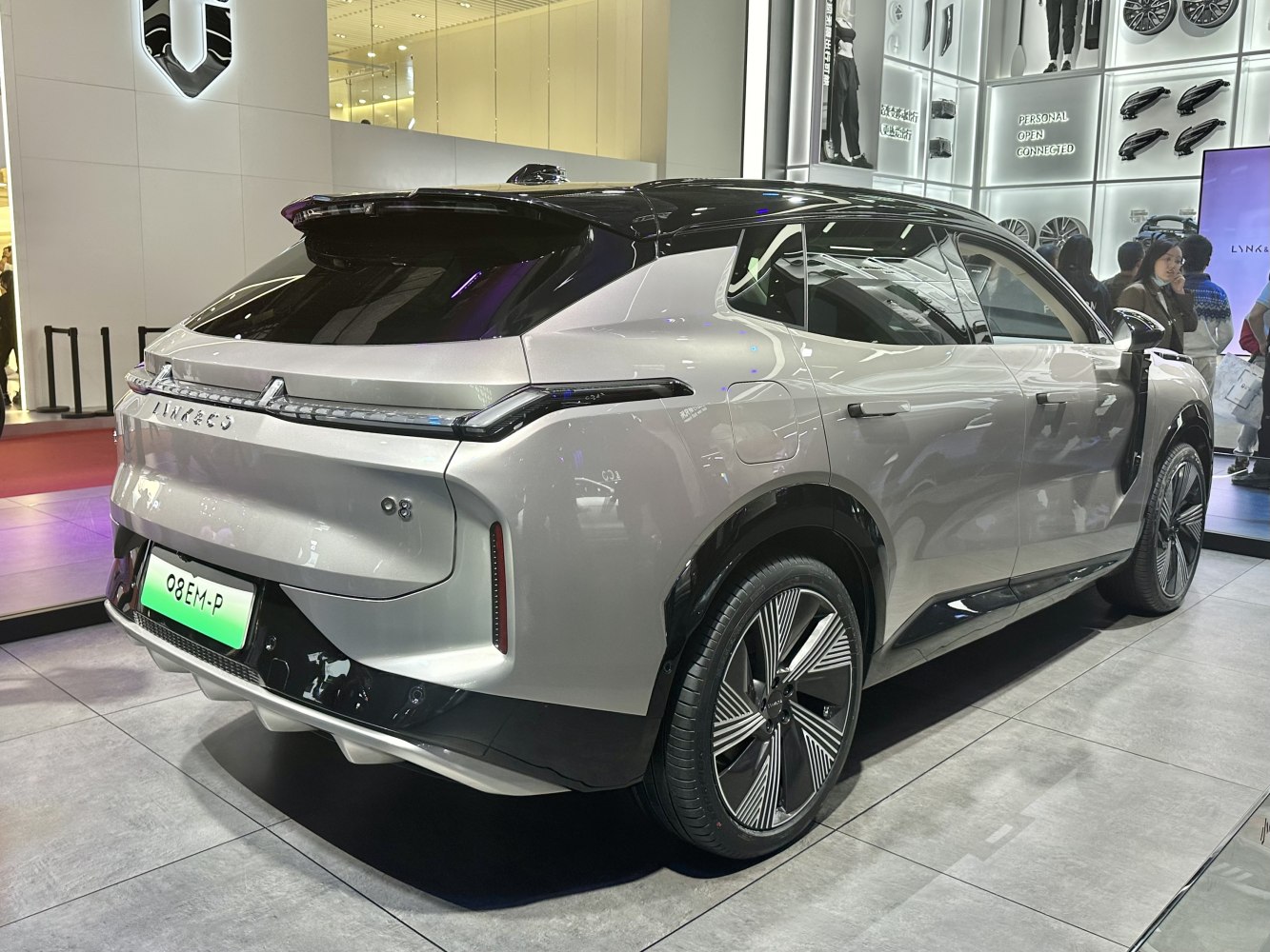 Rear side view with futuristic tail lights and sleek SUV design
