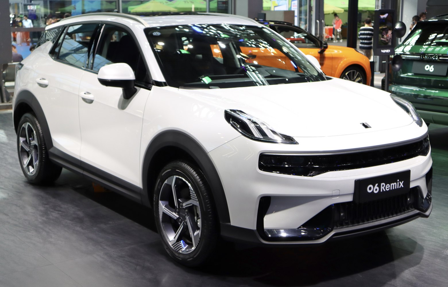 Front three-quarter angle with sleek headlights and alloy wheels