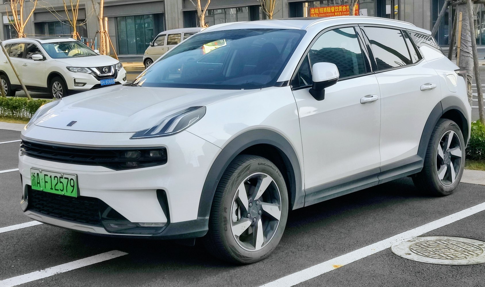 Front angle of SUV with split LED headlights and aerodynamic styling