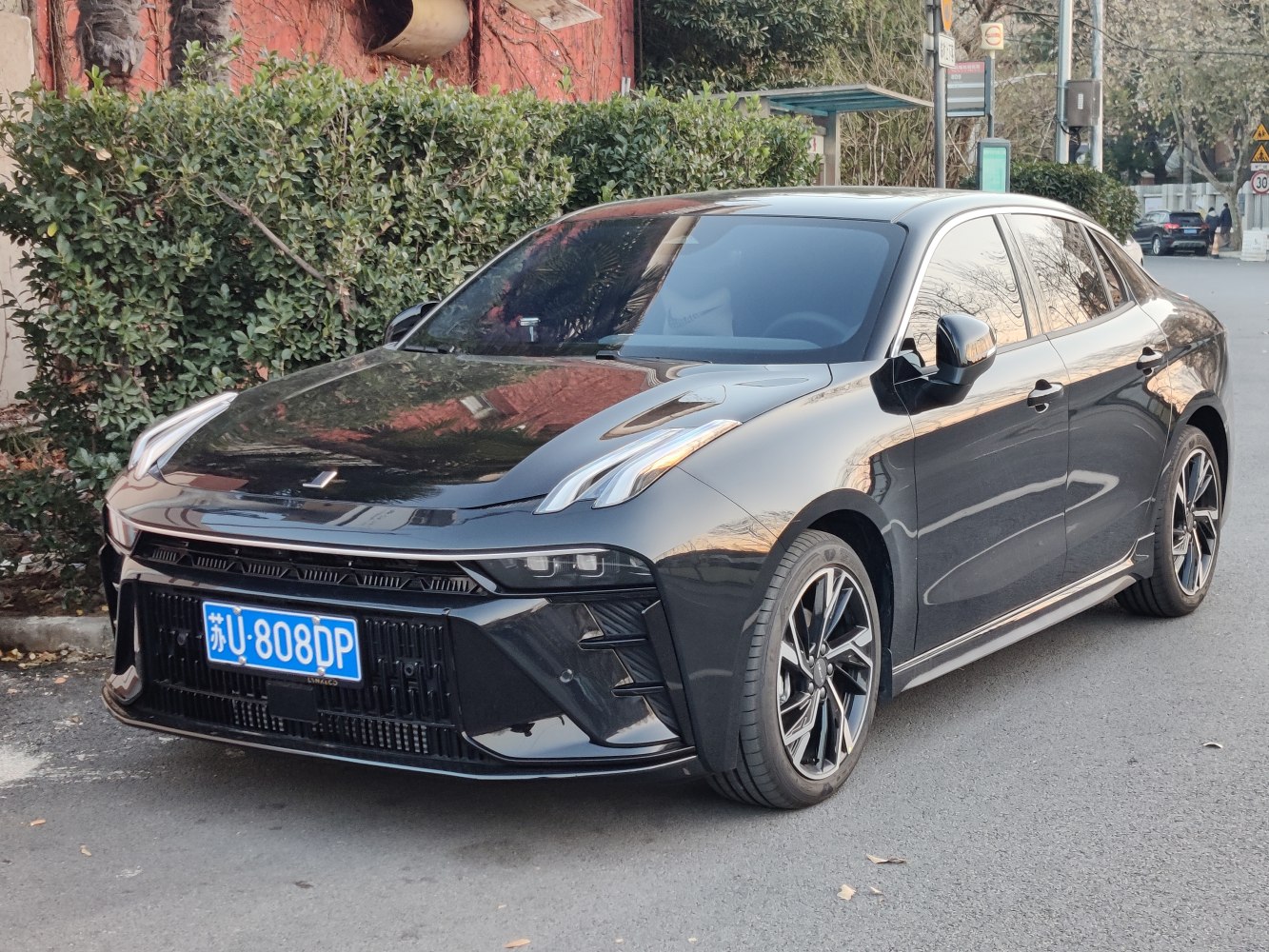 Modern sedan with distinctive vertical LED daytime running lights and sleek aerodynamic body