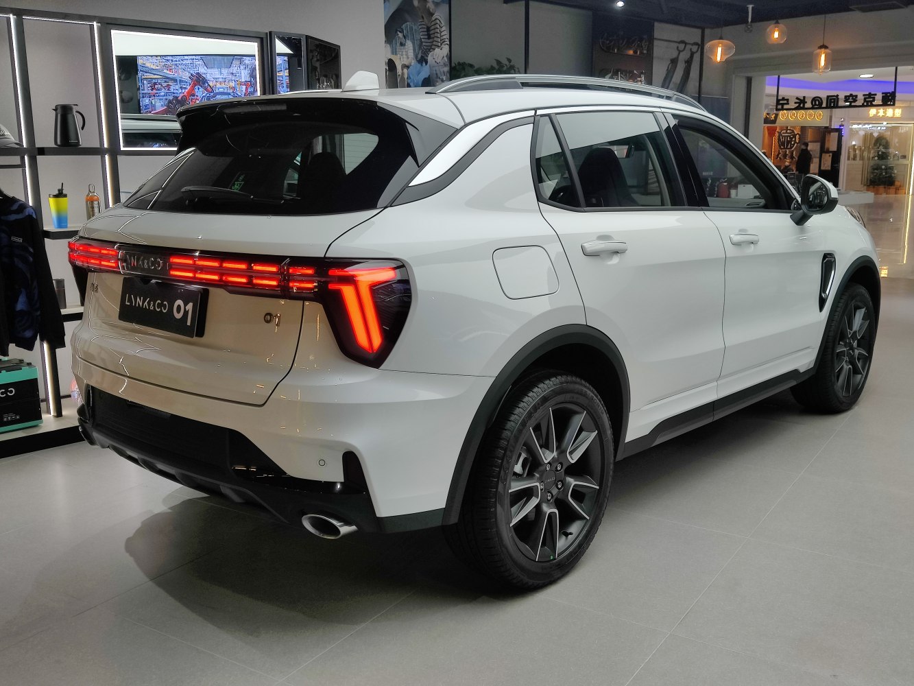 Rear side view with distinctive taillights and sporty SUV features