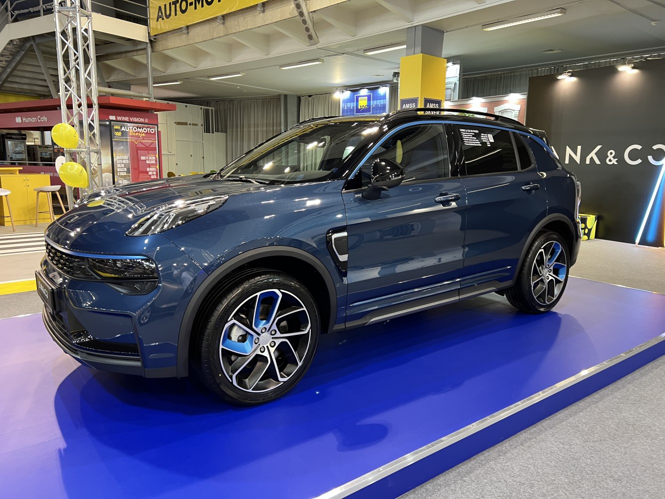 Blue-accented wheels, aerodynamic modern SUV design