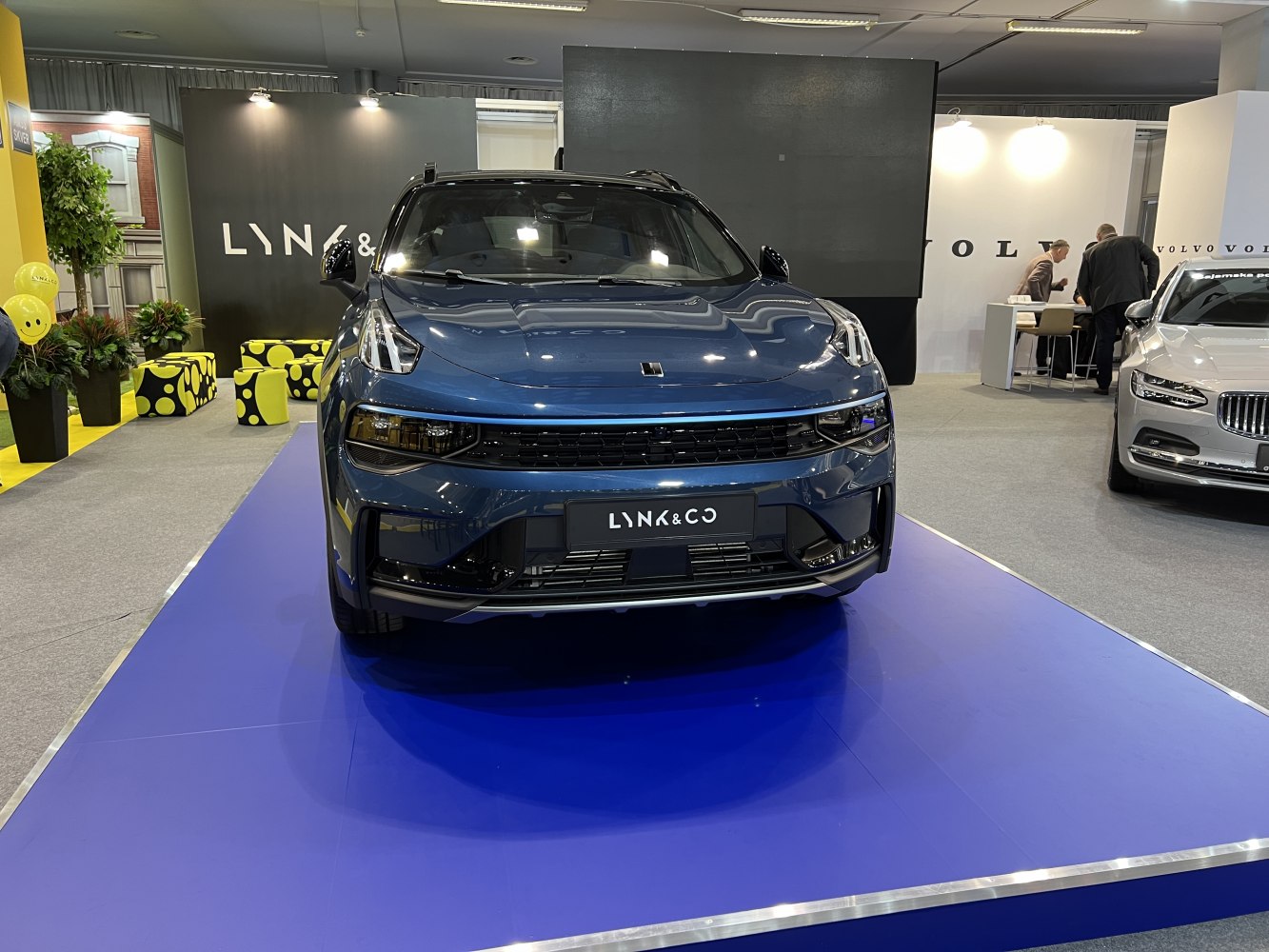 Front view of modern SUV with distinctive headlights and black grille