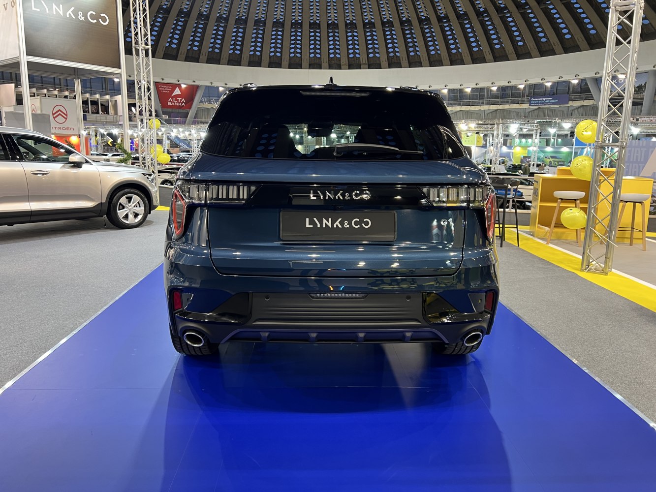 Rear view with sleek segmented taillights and dual exhausts